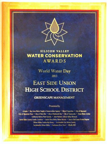 award plaque with text "Silicon valley water conservation awards, world water day 2013, east side union high school district, greenscape management" Further text illegible.
